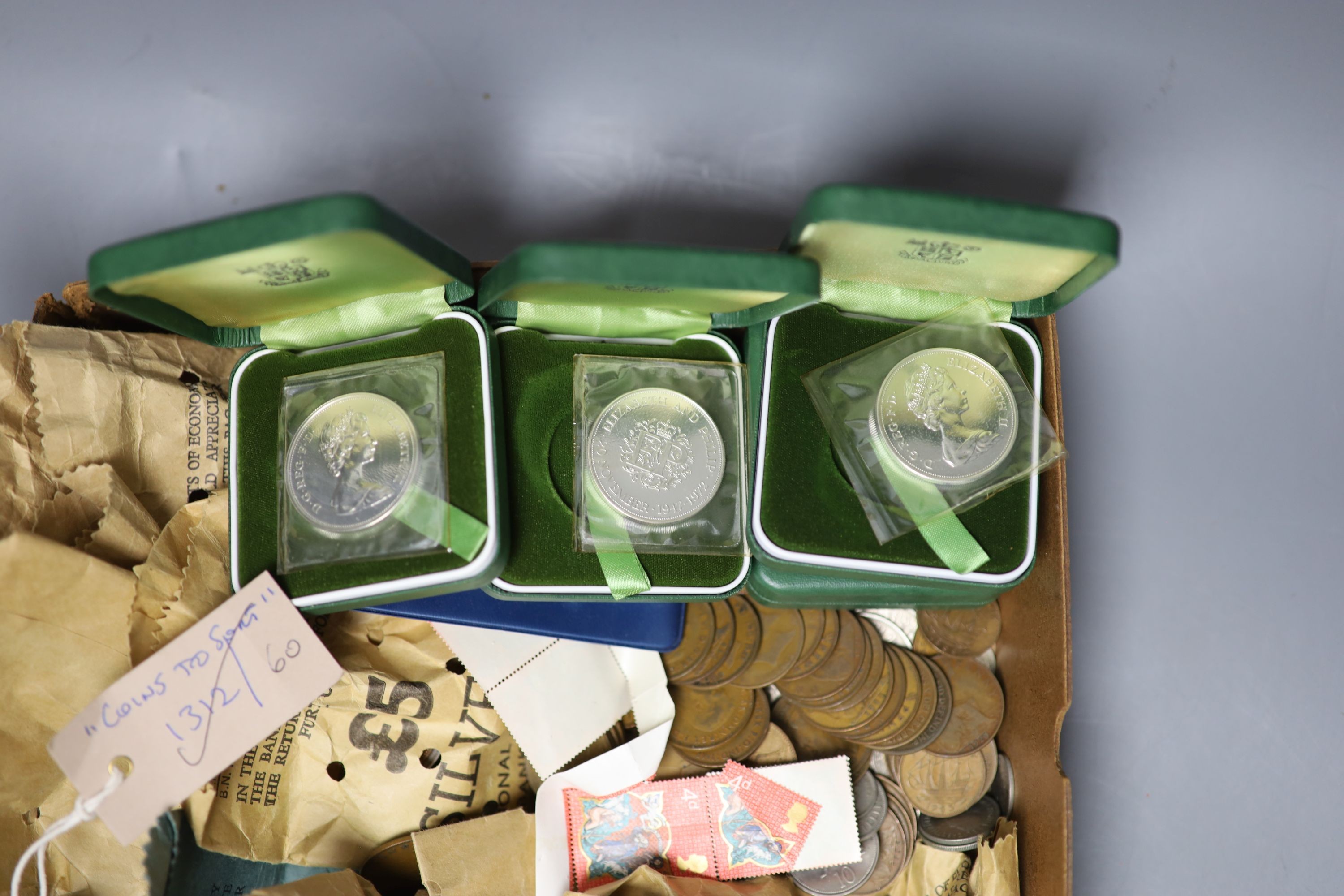 Six Elizabeth II 1972 sterling silver crowns and a quantity of assorted coinage.